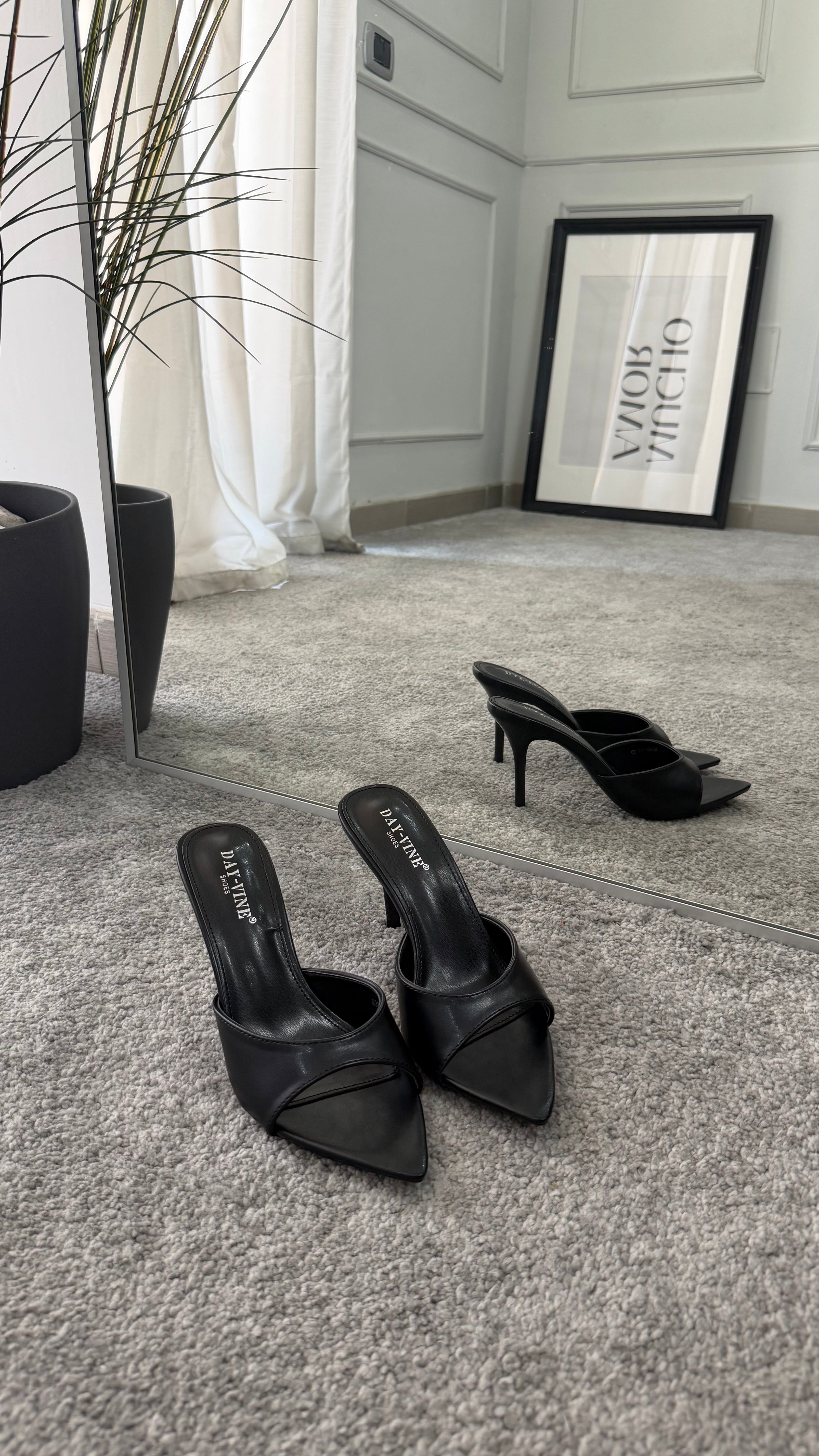 Mules punta black